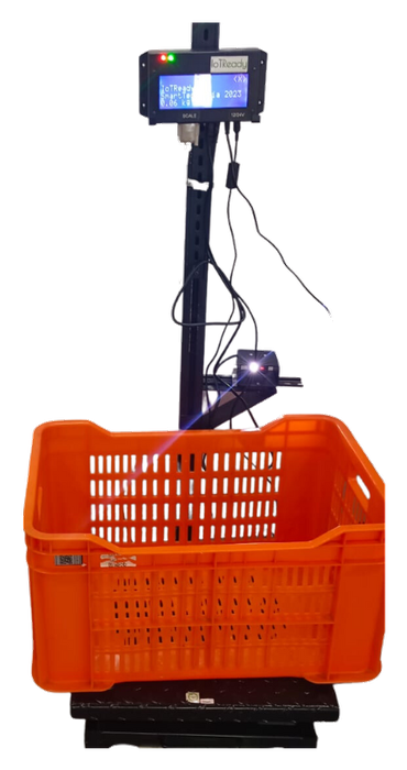 IoTReady data logger with an integrated barcode scanner mounted above a crate on a weighing platform