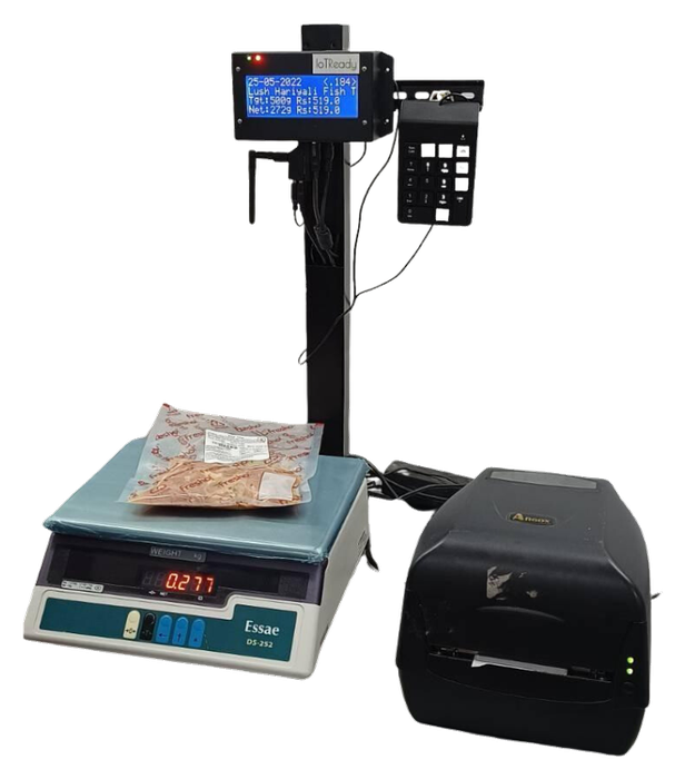 IoTReady data logger mounted on an existing RS232 weighing scale, wired to a thermal label printer
